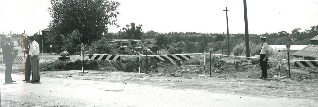 photo of police on a dirt road