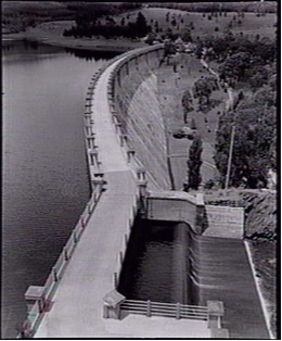 Photograph taken 1 December 1948 showing the dam wall and valley floor of the park. Note the plantings on the valley floor and hillside beyond